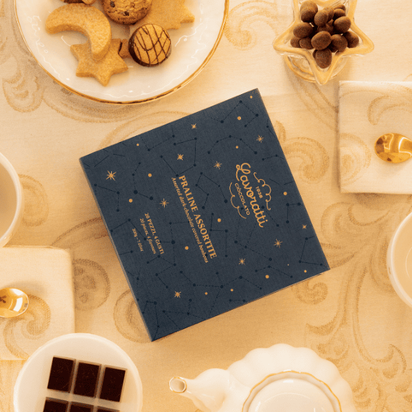 Una selezione di venti praline per accompagnare il tempo delle feste di Natale con eleganza e gusto